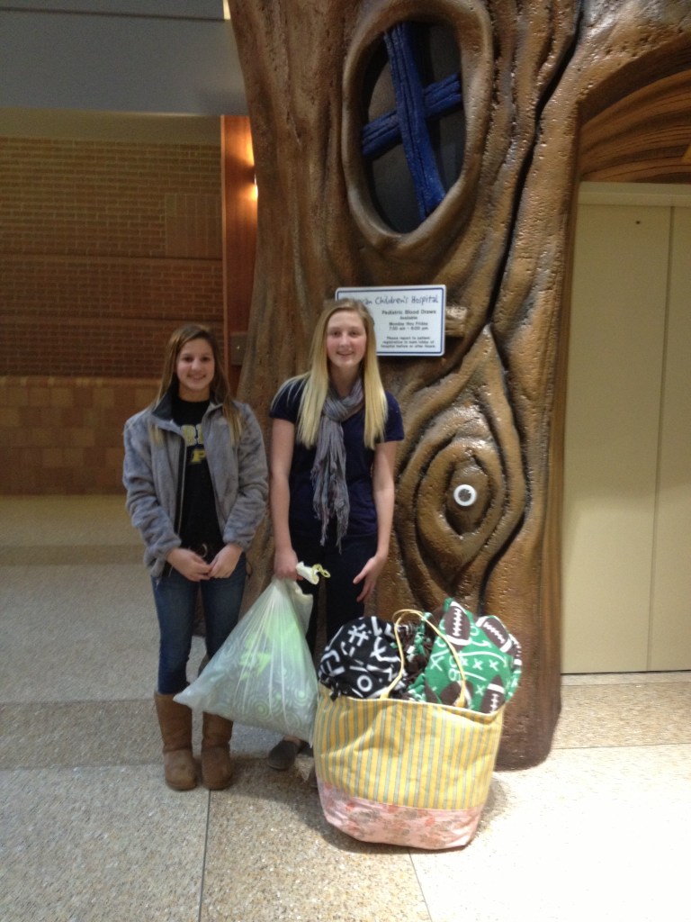 Impact 52 delivers blankets to the hospital